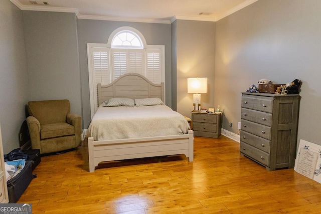 430 Brantley Rdg, Warner Robins, GA 31088 - bedroom with light wood-style floors and crown molding
