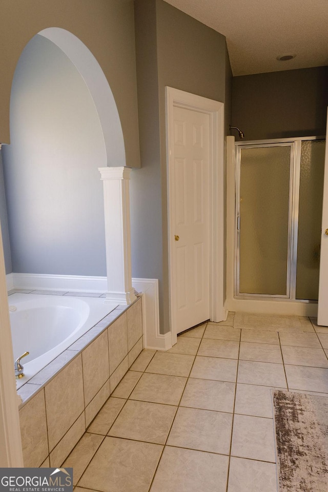 430 Brantley Rdg, Warner Robins, GA 31088 - full bathroom with a stall shower, a bath, and tile patterned flooring