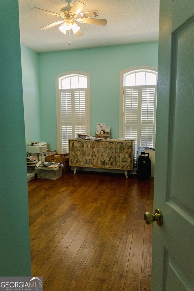 430 Brantley Rdg, Warner Robins, GA 31088 - bedroom featuring dark wood-style flooring, multiple windows, and ceiling fan