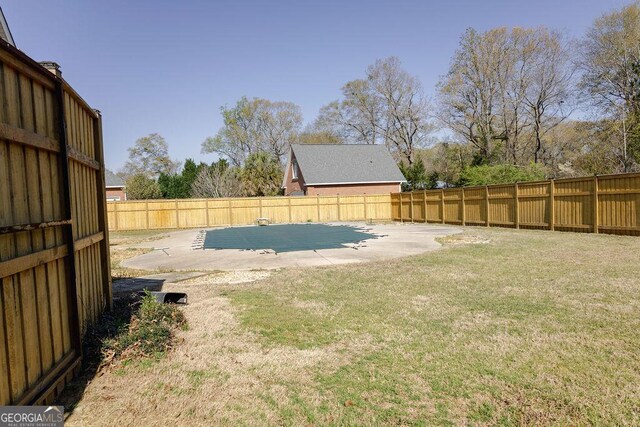 430 Brantley Rdg, Warner Robins, GA 31088 - fenced backyard with a patio area