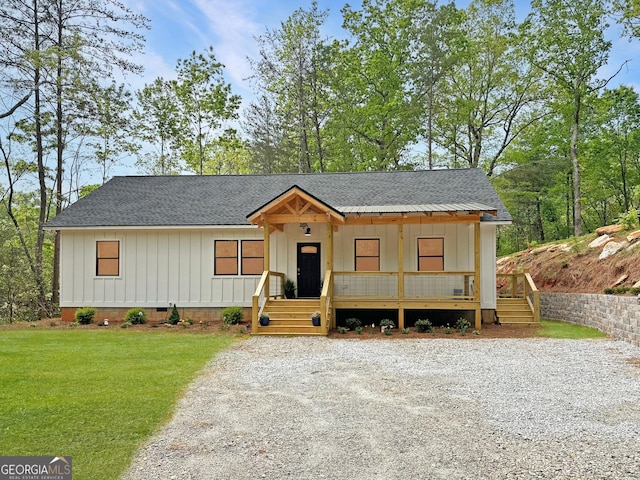 164 Colorado Ln, Clayton, GA 30525 - view of front of house featuring covered porch, a shingled roof, and crawl space