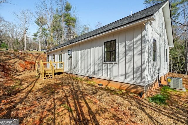 164 Colorado Ln, Clayton, GA 30525 - view of front facade with central air condition unit, a shingled roof, and crawl space