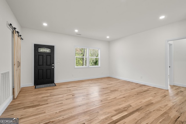 164 Colorado Ln, Clayton, GA 30525 - kitchen with light wood finished floors, white cabinetry, appliances with stainless steel finishes, and a sink