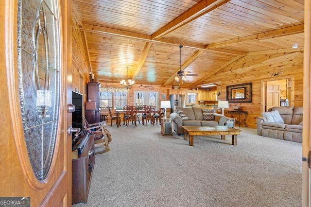 105 Oak View Trl, Cleveland, GA 30528 - carpeted living area featuring wood walls, wooden ceiling, a ceiling fan, and a chandelier