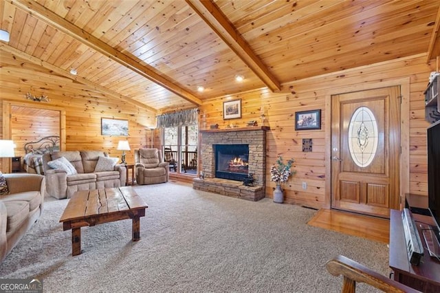 carpeted living area with wooden walls, a fireplace, wood ceiling, and lofted ceiling with beams