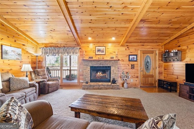 carpeted living area featuring wood ceiling, wooden walls, and lofted ceiling with beams