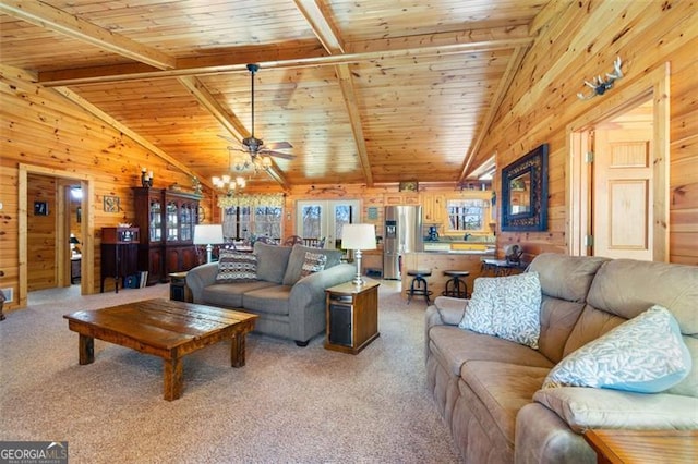 living room featuring light colored carpet, wood ceiling, wooden walls, and vaulted ceiling with beams