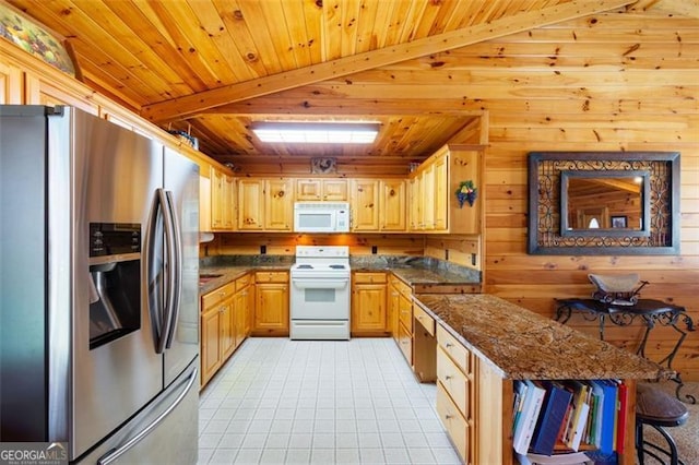 kitchen featuring wooden ceiling, light tile patterned floors, wooden walls, beamed ceiling, and appliances with stainless steel finishes