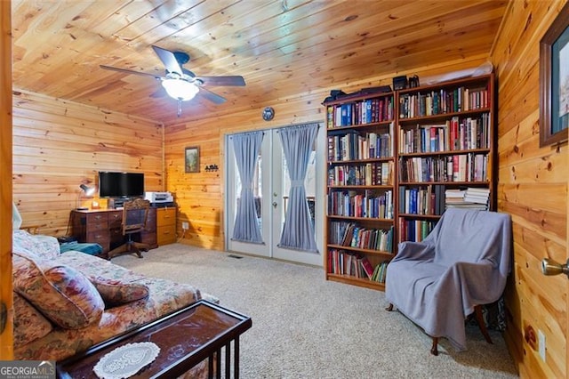 105 Oak View Trl, Cleveland, GA 30528 - living area featuring wooden walls, carpet, wooden ceiling, and ceiling fan
