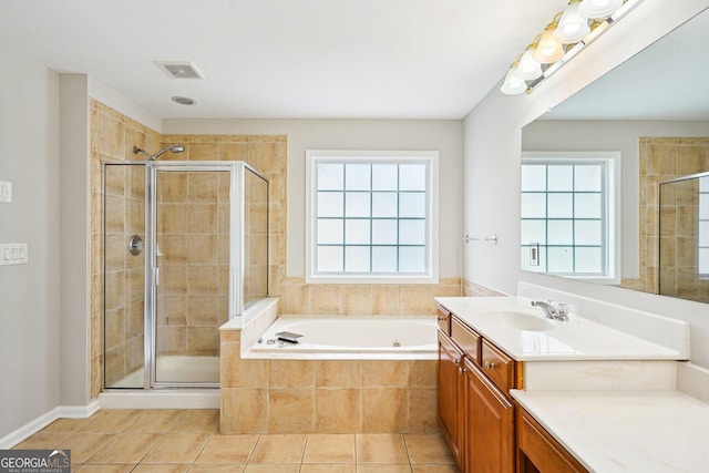 2848 Stockbridge Way, Dacula, GA 30019 - bathroom featuring vanity, a jetted tub, a stall shower, and tile patterned flooring