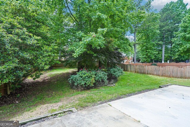 2848 Stockbridge Way, Dacula, GA 30019 - view of yard featuring a patio area