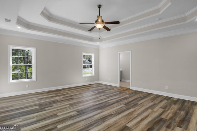 243 Barrington Oaks Dr, Brunswick, GA 31523 - unfurnished room featuring a tray ceiling, a ceiling fan, and ornamental molding