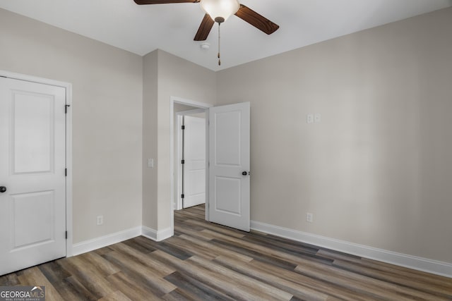 243 Barrington Oaks Dr, Brunswick, GA 31523 - unfurnished bedroom featuring wood finished floors, baseboards, and ceiling fan
