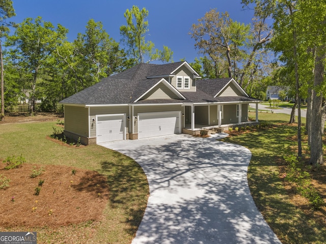 243 Barrington Oaks Dr, Brunswick, GA 31523 - craftsman inspired home with roof with shingles, driveway, a porch, an attached garage, and a front yard