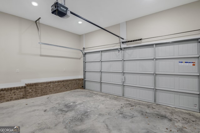 243 Barrington Oaks Dr, Brunswick, GA 31523 - garage with a garage door opener and recessed lighting