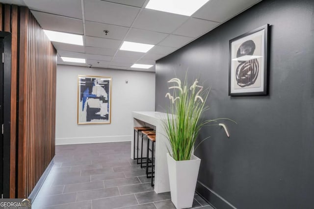 620 Peachtree St NE Unit 1413, Atlanta, GA 30308 - corridor with baseboards and a paneled ceiling