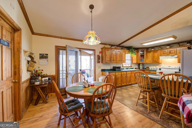 224 Buckshot Ln, Tiger, GA 30576 - dining room featuring wainscoting, light wood-style flooring, and ornamental molding