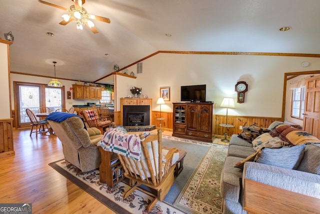 224 Buckshot Ln, Tiger, GA 30576 - living area with a ceiling fan, wainscoting, lofted ceiling, light wood-type flooring, and ornamental molding