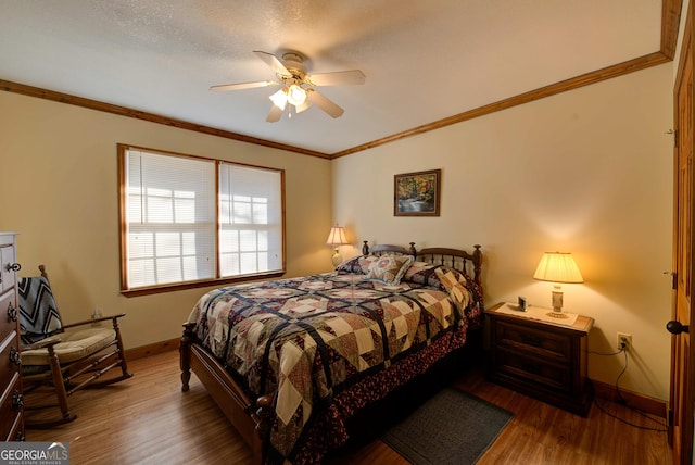 224 Buckshot Ln, Tiger, GA 30576 - bedroom featuring baseboards, wood finished floors, and crown molding