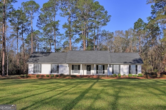 ranch-style house with a front lawn