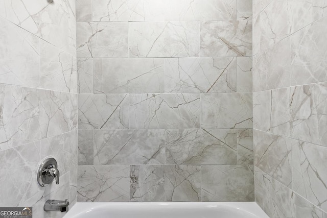full bath featuring shower / bathtub combination