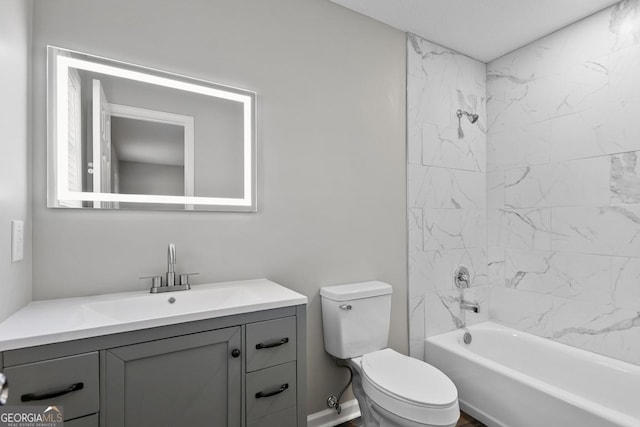 full bath featuring  shower combination, toilet, and vanity