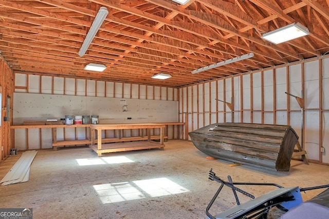 misc room featuring a workshop area