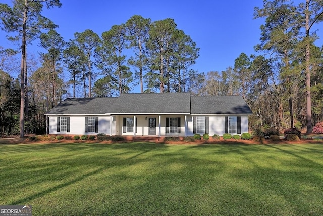 single story home with covered porch and a front yard
