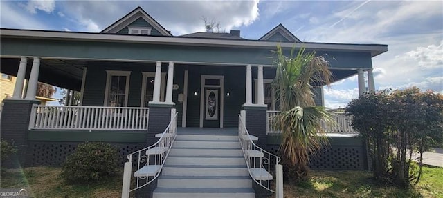 807 Elizabeth St, Waycross, GA 31503 - view of front facade with a porch and stairway