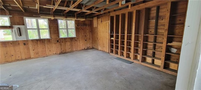 807 Elizabeth St, Waycross, GA 31503 - miscellaneous room featuring unfinished concrete floors and wooden walls