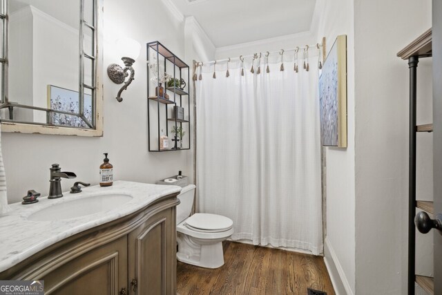 3491 Falls Branch Ct, Buford, GA 30519 - bathroom with ornamental molding, toilet, wood finished floors, vanity, and a shower with shower curtain