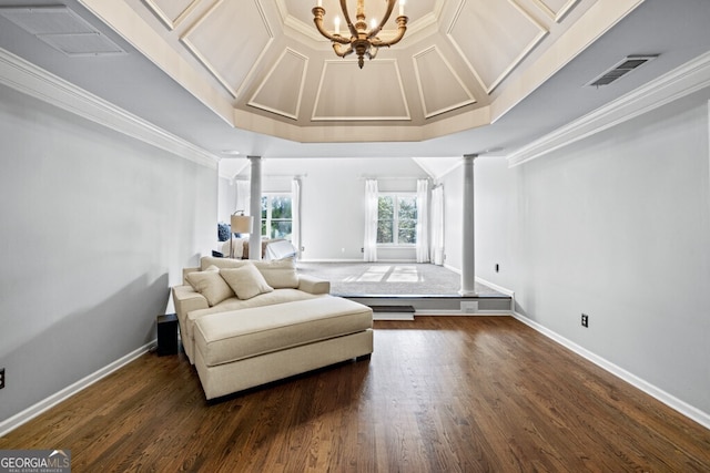 3491 Falls Branch Ct, Buford, GA 30519 - sitting room featuring ornate columns, dark wood finished floors, a chandelier, and crown molding