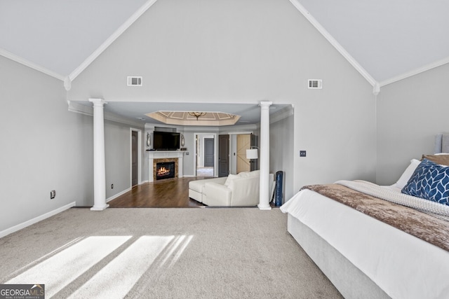 3491 Falls Branch Ct, Buford, GA 30519 - carpeted bedroom featuring ornamental molding, ornate columns, a warm lit fireplace, high vaulted ceiling, and baseboards