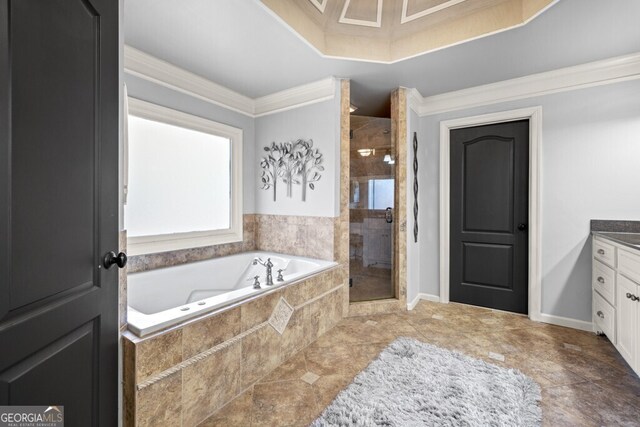 3491 Falls Branch Ct, Buford, GA 30519 - bathroom featuring a stall shower, a garden tub, crown molding, and vanity