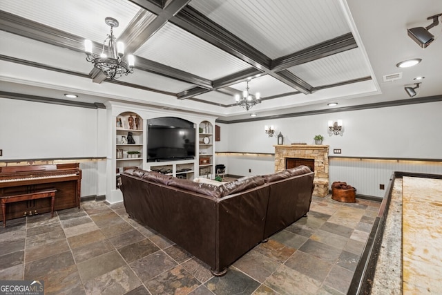 3491 Falls Branch Ct, Buford, GA 30519 - living area with a chandelier, coffered ceiling, ornamental molding, stone tile floors, and a stone fireplace