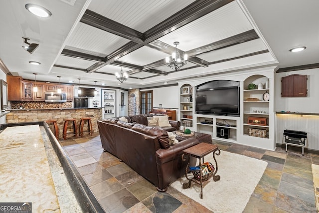 3491 Falls Branch Ct, Buford, GA 30519 - living room with crown molding, a chandelier, stone tile floors, built in features, and beamed ceiling