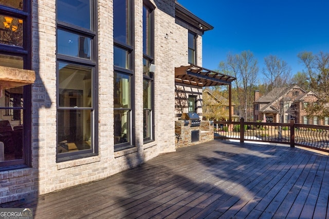 3491 Falls Branch Ct, Buford, GA 30519 - wooden deck featuring exterior kitchen and area for grilling