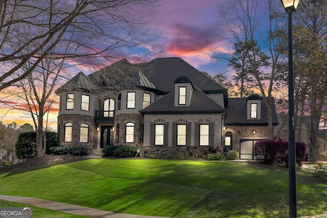 3491 Falls Branch Ct, Buford, GA 30519 - view of front of property with a balcony, stone siding, and a front yard