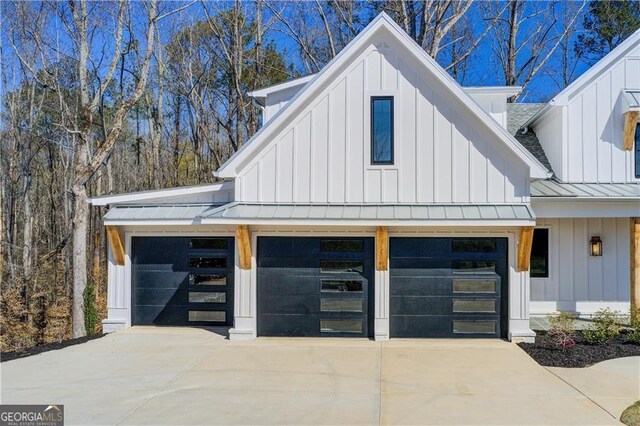 garage with concrete driveway