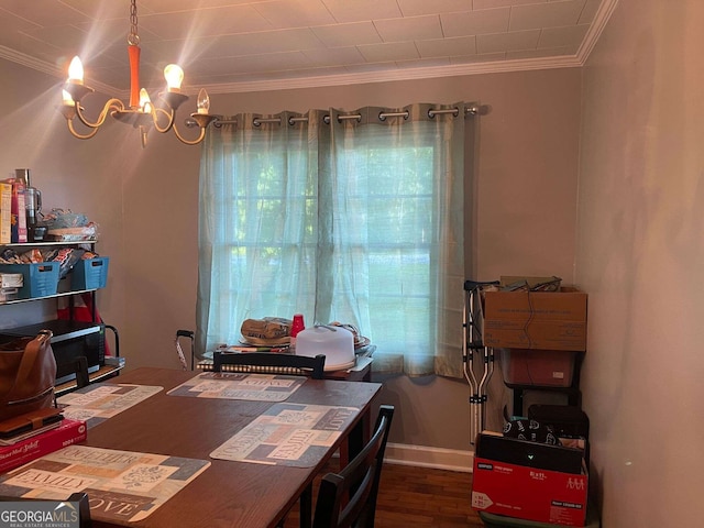 home office with crown molding, wood finished floors, and a chandelier