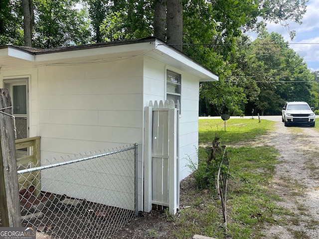 view of outdoor structure with fence