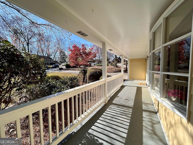 wooden deck with covered porch
