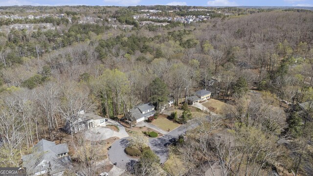bird's eye view featuring a view of trees