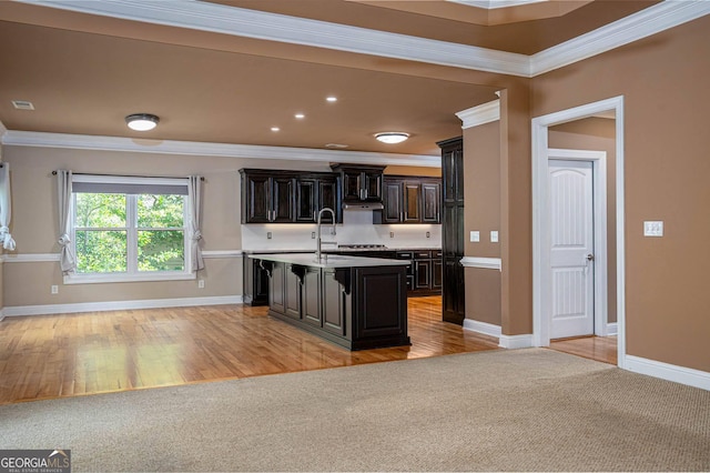 kitchen with baseboards and ornamental molding