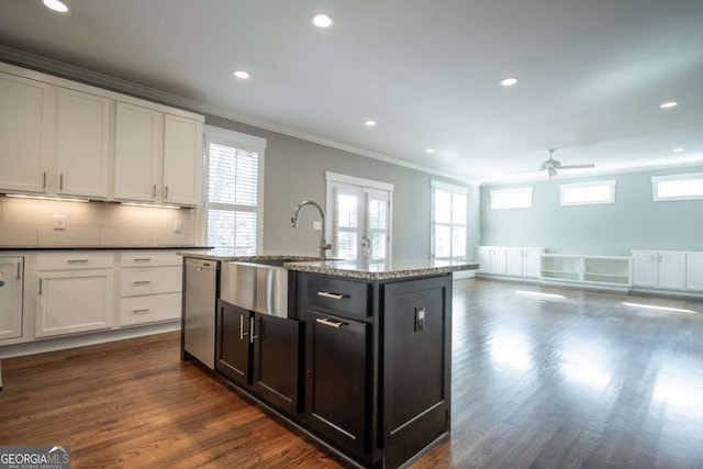 215 Chapman Pl, Athens, GA 30606 - kitchen featuring dishwasher, crown molding, a ceiling fan, dark wood-type flooring, and recessed lighting