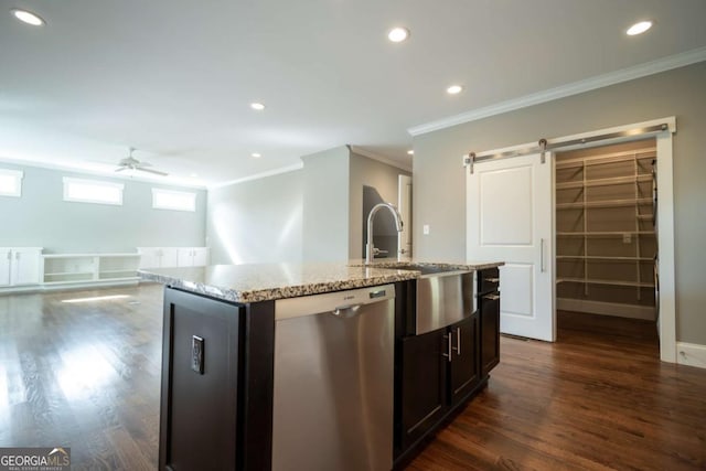 215 Chapman Pl, Athens, GA 30606 - kitchen featuring dishwasher, crown molding, an island with sink, a ceiling fan, and dark wood finished floors