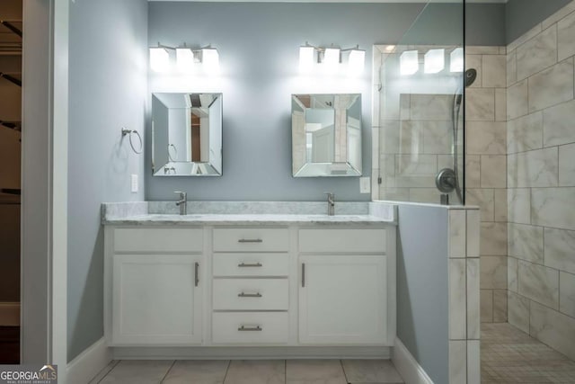 215 Chapman Pl, Athens, GA 30606 - bathroom featuring walk in shower, double vanity, and marble look tiles