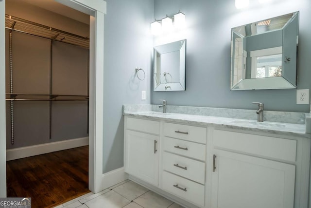 215 Chapman Pl, Athens, GA 30606 - bathroom with double vanity and baseboards