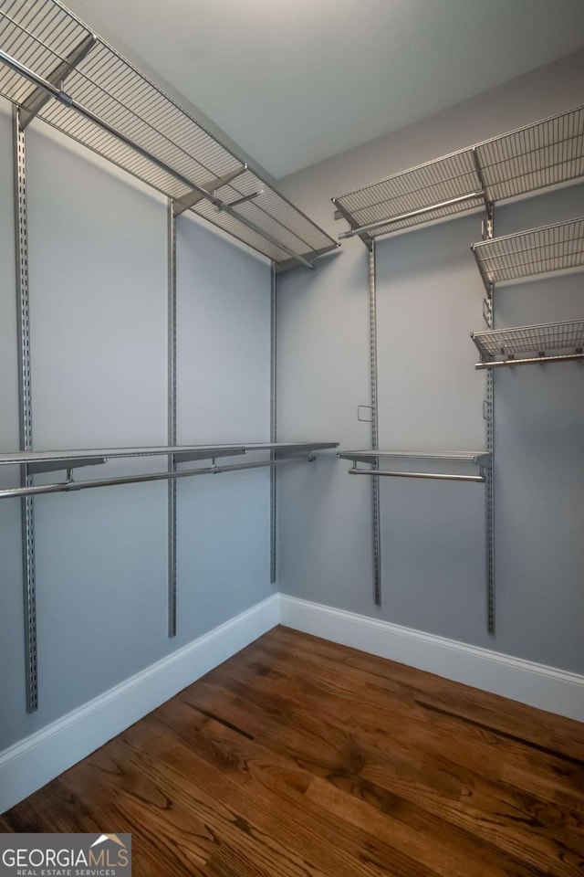 215 Chapman Pl, Athens, GA 30606 - walk in closet featuring wood finished floors