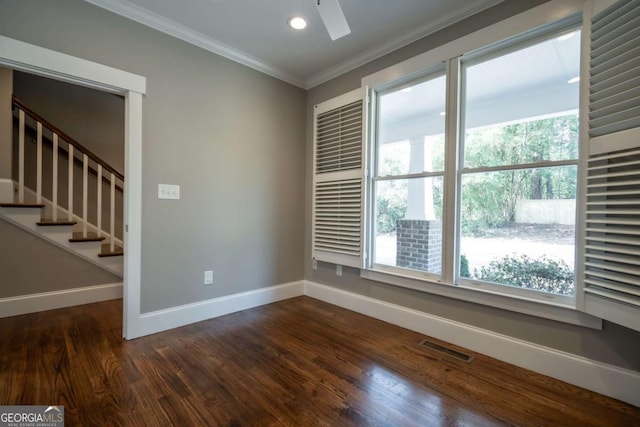 215 Chapman Pl, Athens, GA 30606 - unfurnished room with crown molding, dark wood finished floors, stairs, and recessed lighting